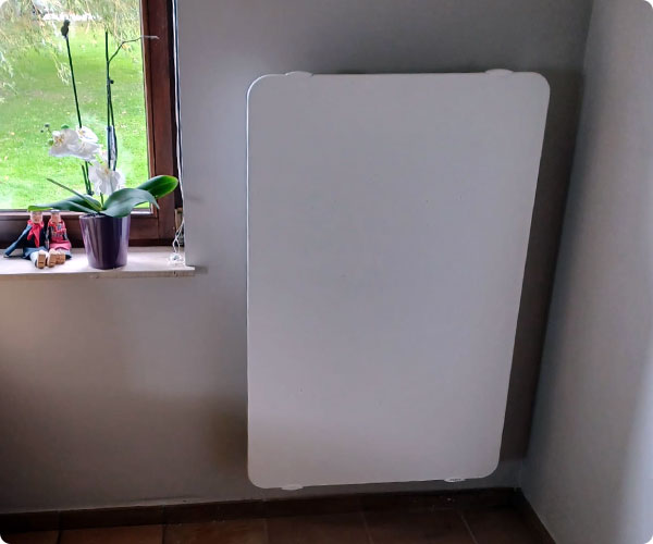 radiateur électrique en pierre de lave dans un salon à Nandrin