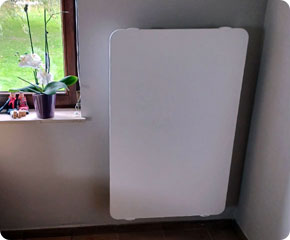 radiateur électrique en pierre de lave dans un salon à Nandrin